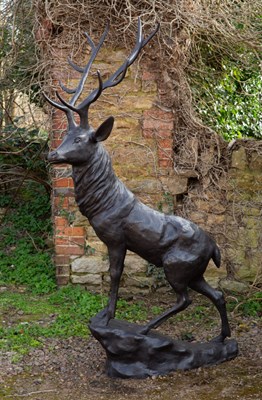 Lot 1248 - A large bronze sculpture of a stag