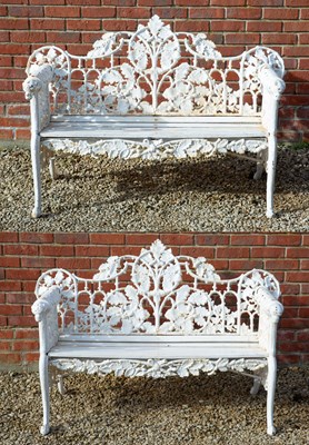 Lot 1246 - A pair of cast iron benches