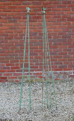 Lot 1346 - A pair of green painted conical wrought iron obelisks