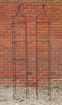 Lot 1283 - A pair of wrought-iron garden obelisks or plant supports