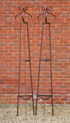 Lot 1330 - A pair of wrought iron garden obelisks of plant supports