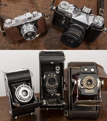 Lot 269 - Collection of vintage cameras all with leather...