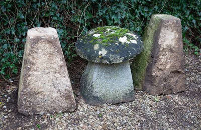 Lot 1245 - A small staddle stone together with two staddle stone bases