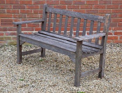 Lot 1152 - A small teak garden bench