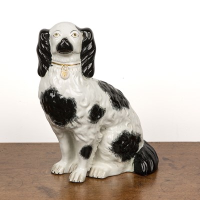 Lot 256 - Staffordshire spaniel 19th Century, black and...