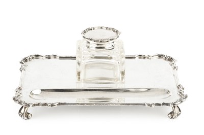 Lot 899 - A George V silver inkstand, of shaped...