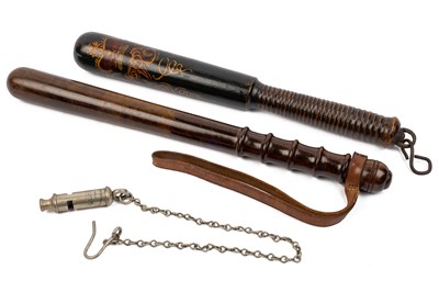 Lot 1095 - A Victorian Policemans' truncheon, a further truncheon, and a whistle