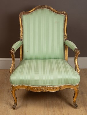 Lot 20 - An 18th century Italian gilt and carved framed open armchair