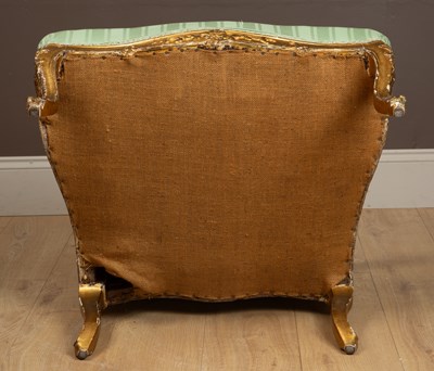 Lot 20 - An 18th century Italian gilt and carved framed open armchair