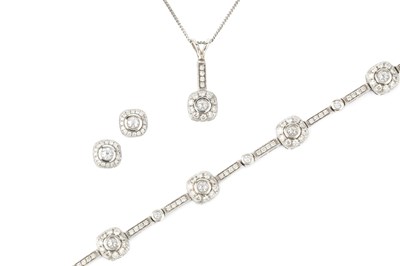 Lot 288 - A suite of diamond set 14k white gold...