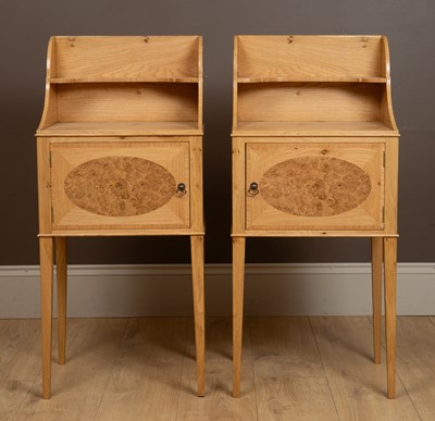 Lot 482 - A pair of burr oak and walnut inlaid bedside tables