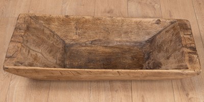 Lot 1077 - A rustic carved wooden trug