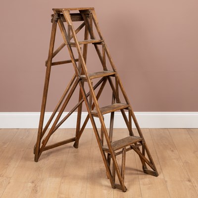 Lot 1307 - An old wooden stepladder