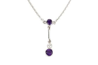 Lot 294 - An 18ct white gold, amethyst and diamond...