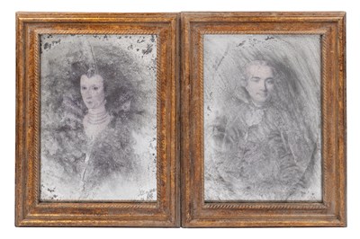 Lot 392 - A pair of decorative mirrored portraits