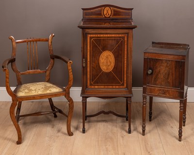 Lot 70 - An Edwardian inlaid music cabinet together with an open armchair and a pot cupboard.