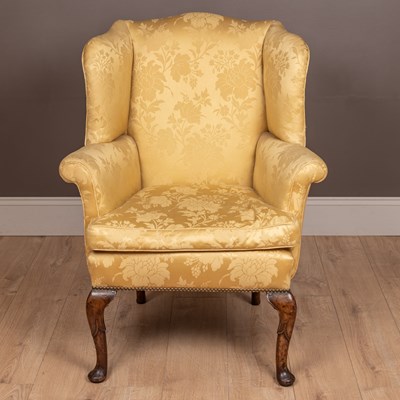 Lot 61 - An antique Georgian style small wingback armchair