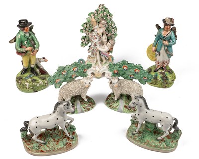 Lot 64 - A collection of seven pottery figures