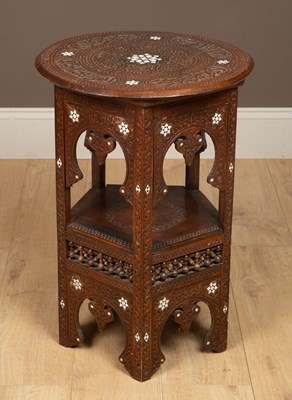 Lot 334 - An Islamic carved hexagonal table