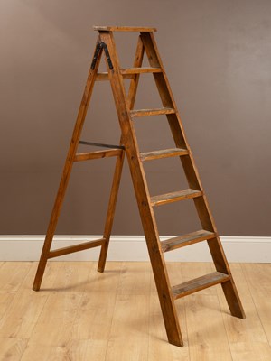 Lot 1051 - A fruitwood stepladder