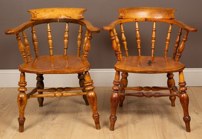 Lot 1110 - Two Victorian smoker's bow ash and elm armchairs