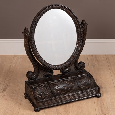 Lot 335 - A Victorian oak carved dressing table mirror