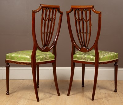 Lot 373 - A pair of Edwardian painted mahogany shield back chairs