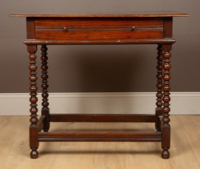 Lot 434 - A 17th century and later fruitwood side table