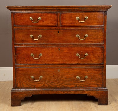 Lot 1112 - A George III oak country made chest of drawers