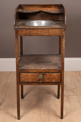 Lot 1116 - An early 19th century country made oak washstand