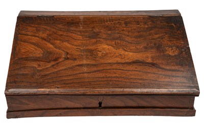 Lot 1074 - A elm wood tabletop writing desk