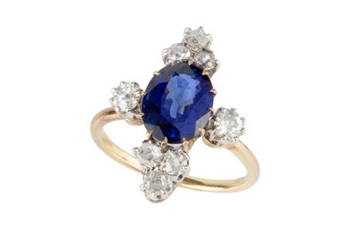 Lot 312 - A sapphire and diamond dress ring, the oval...