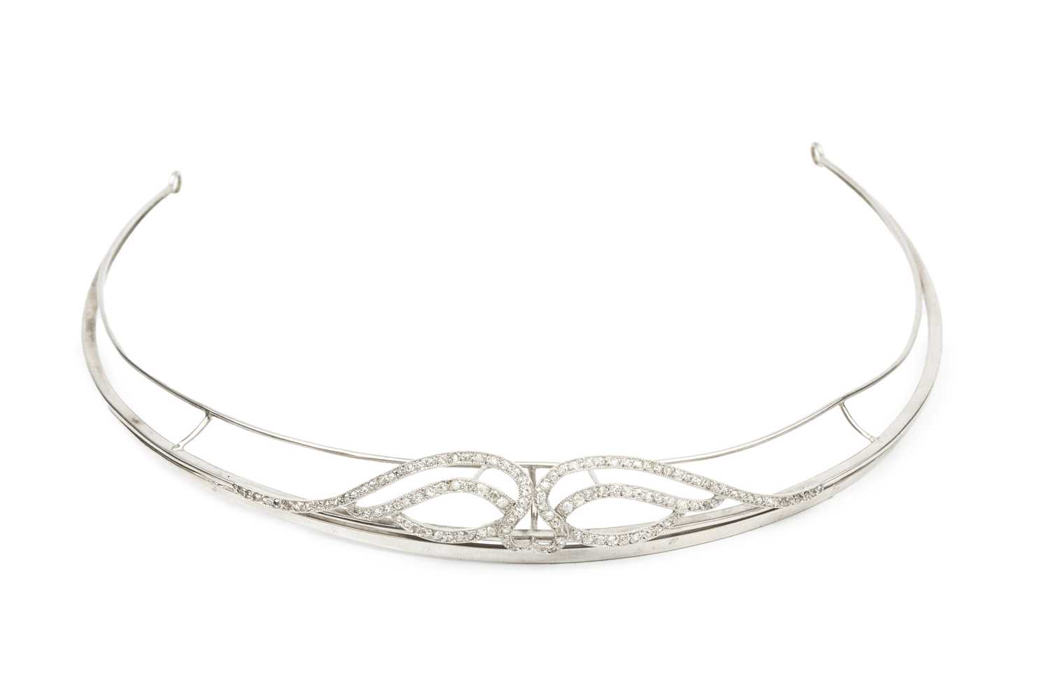 Lot 255 - A diamond set tiara, of shaped and curved...
