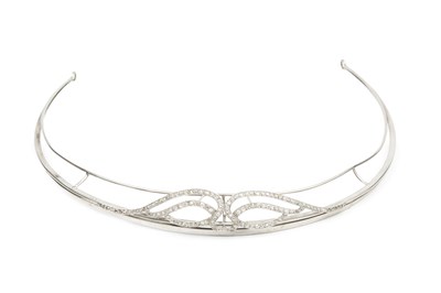 Lot 255 - A diamond set tiara, of shaped and curved...