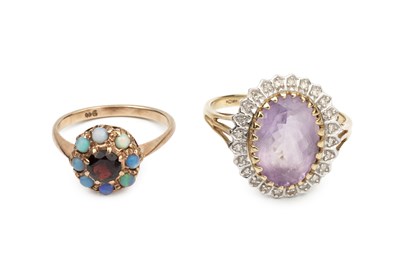 Lot 264 - A 9ct gold, garnet and opal cluster ring, and...