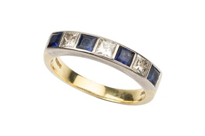 Lot 268 - A sapphire and diamond dress ring, set...