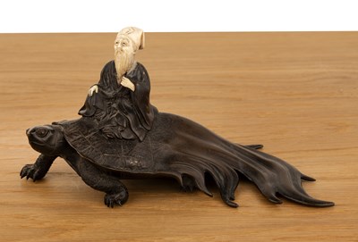 Lot 405 - Bronze and ivory model of a Sennin on a long...