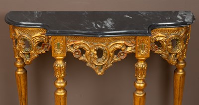 Lot 56 - A Rococo style marble-topped gilt-painted console table