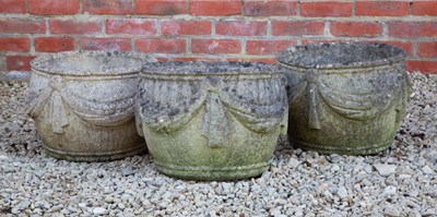 Lot 1318 - A set of three garden planters