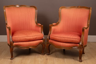 Lot 215 - A pair of French Rococo style tub armchairs