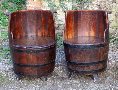 Lot 1236 - A pair of old oak "barrel" seats