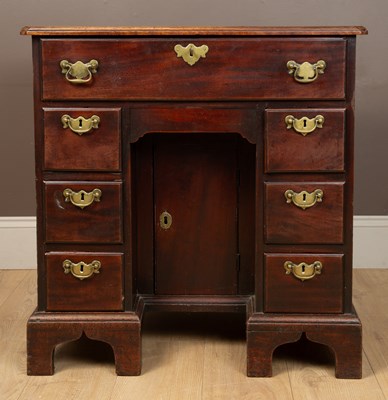 Lot 494 - A Georgian mahogany knee hole desk