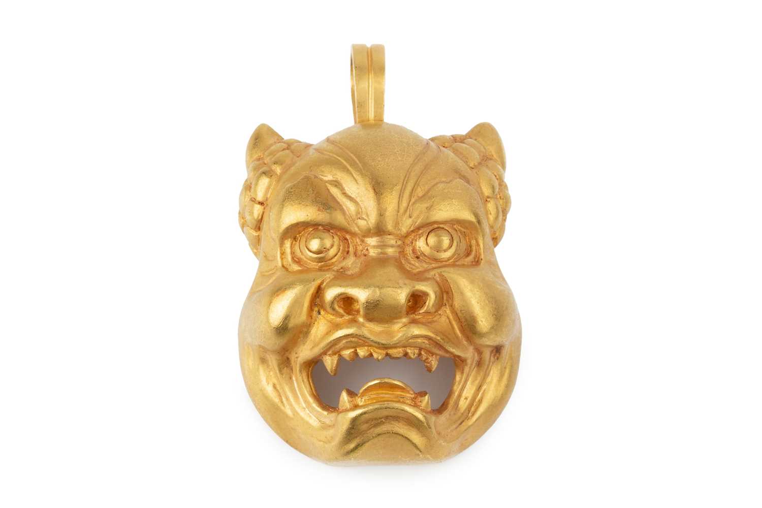 Lot 190 - A 22k gold demon mask pendant and brooch, the...