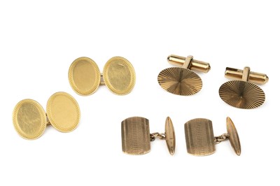 Lot 318 - A pair of 18ct gold oval cufflinks, with...