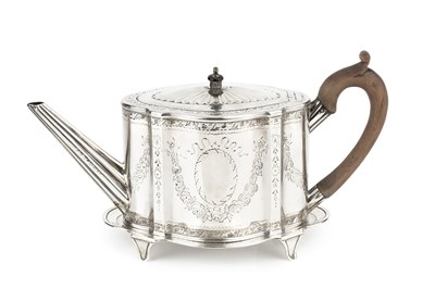 Lot 660 - A George III silver teapot, of shaped oval...