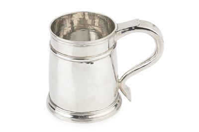 Lot 669 - A Queen Anne Britannia standard silver pint...