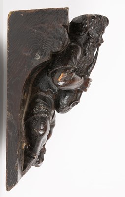 Lot 3 - An 18th/19th century carved oak bracket in the...