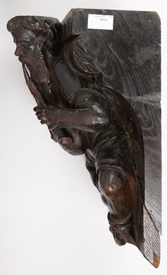Lot 3 - An 18th/19th century carved oak bracket in the...