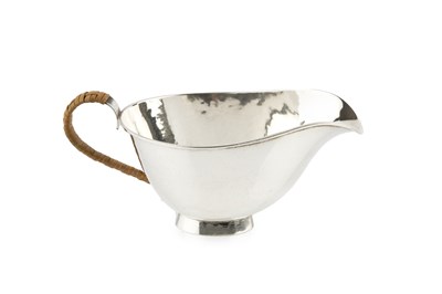 Lot A 20th century Danish silver sauce boat, of...