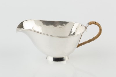 Lot A 20th century Danish silver sauce boat, of...